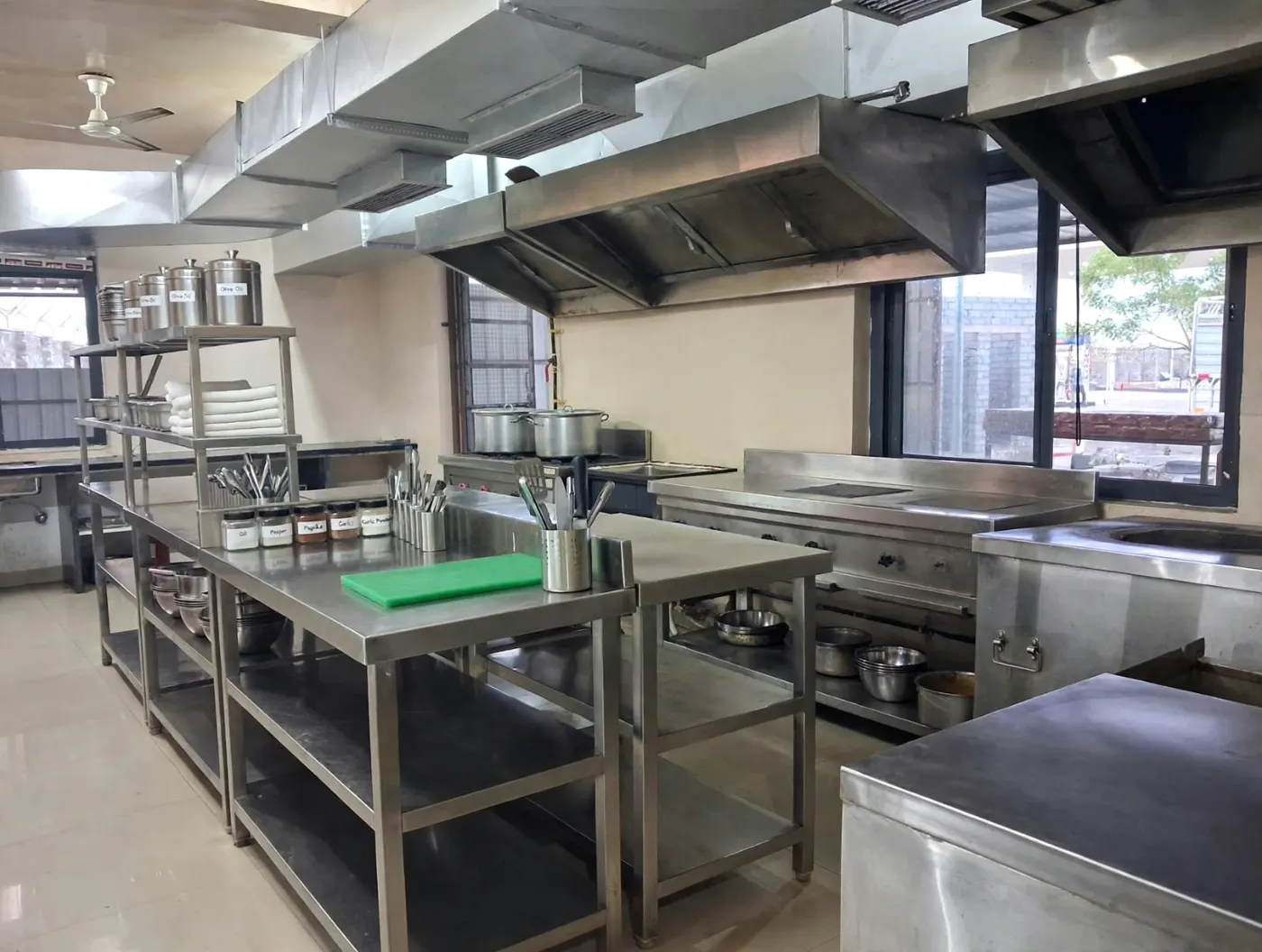 Clean stainless steel pure veg kitchen at Guru Kripa Restaurant, Pachpadra